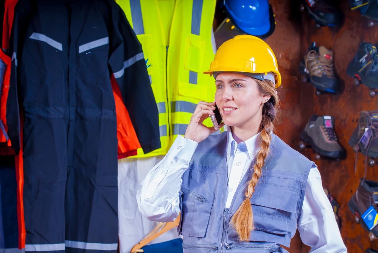 female installer making a call