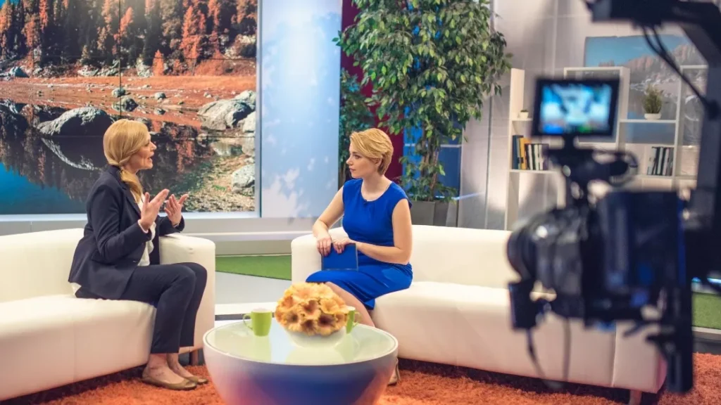 Two women discussing on a live TV program